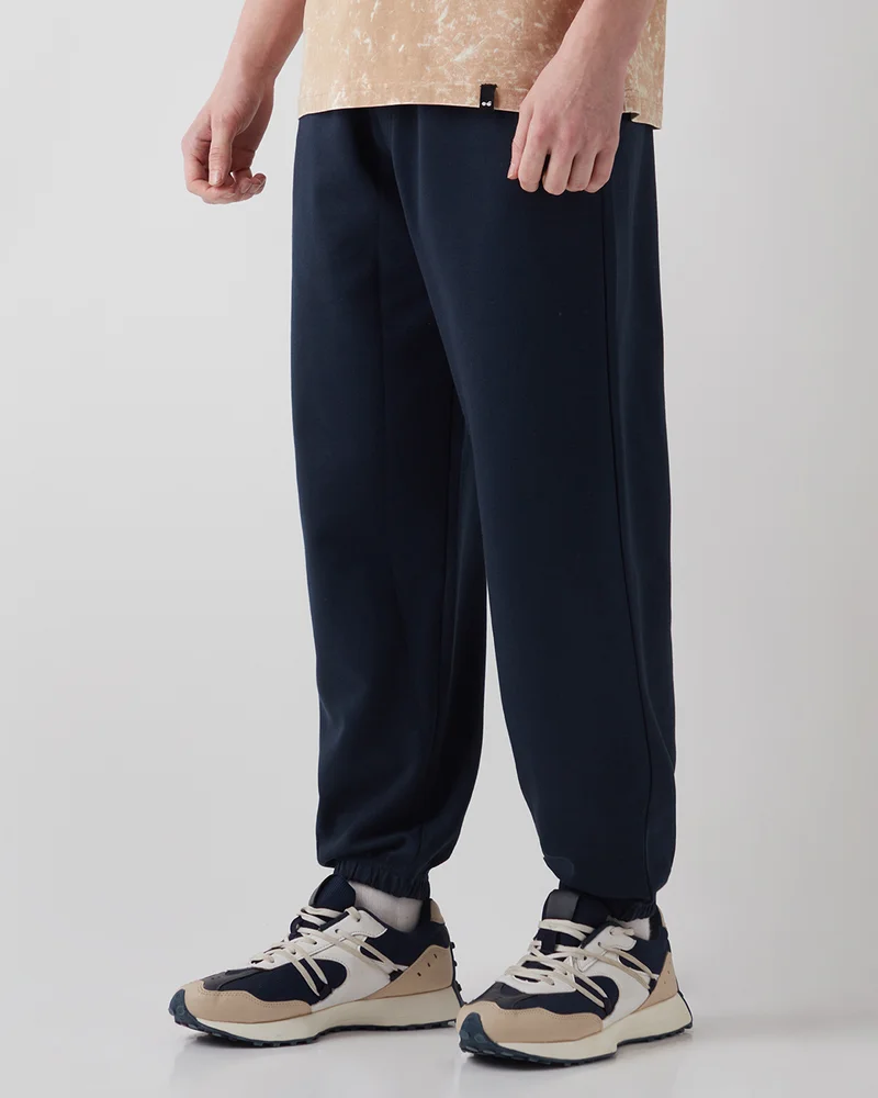 bewakoof Men's Navy Blue Oversized Warm Joggers